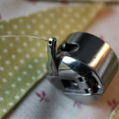 tighten bobbin tension